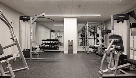 a photo of a gym with weights and other exercise equipment at The Washington at Chatham, Pittsburgh, 15219