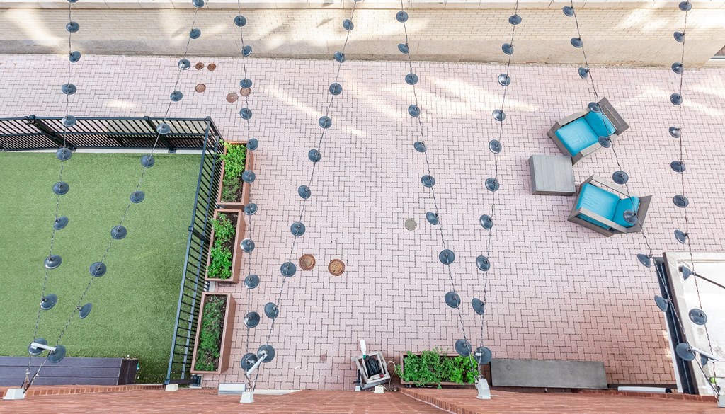 an aerial view of a patio with a lawn and television set at Walnut on Highland, Pittsburgh, PA