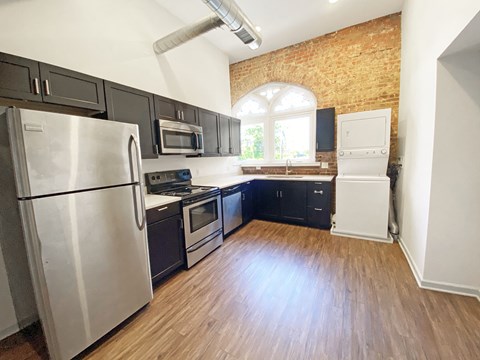 Upgraded Kitchen with Stainless Steel Appliances and Hardwood Flooring at University Commons at McKee Place, 15213