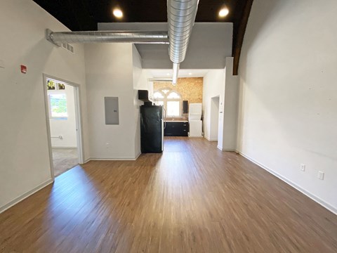 Hardwood Flooring in Kitchen Space at University Commons, Oakland 15213 McKee Place Apartments