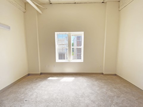 an empty room with a window