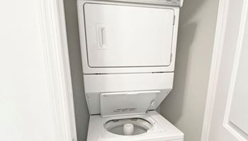 a washer and dryer in a bathroom