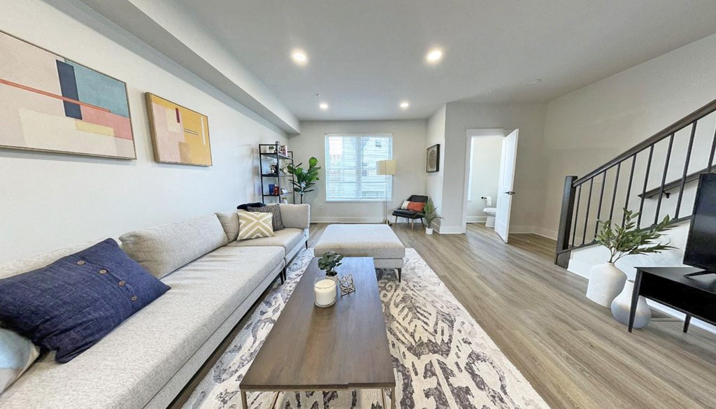 a living room with a couch and a table