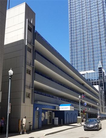 A parking garage with a car parked in front of it  at The Commonwealth Building, Pittsburgh, 15222