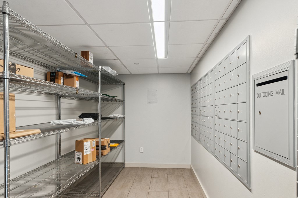 a room with lockers and boxes on the shelves