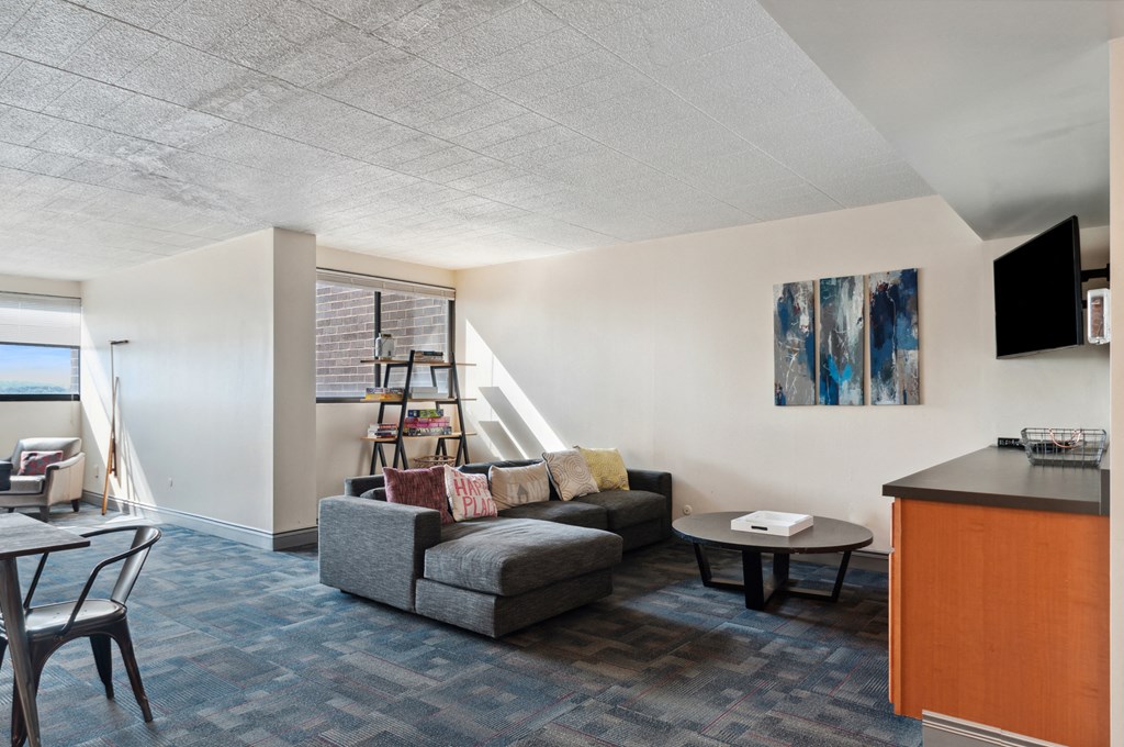 a living room with a couch and a chair