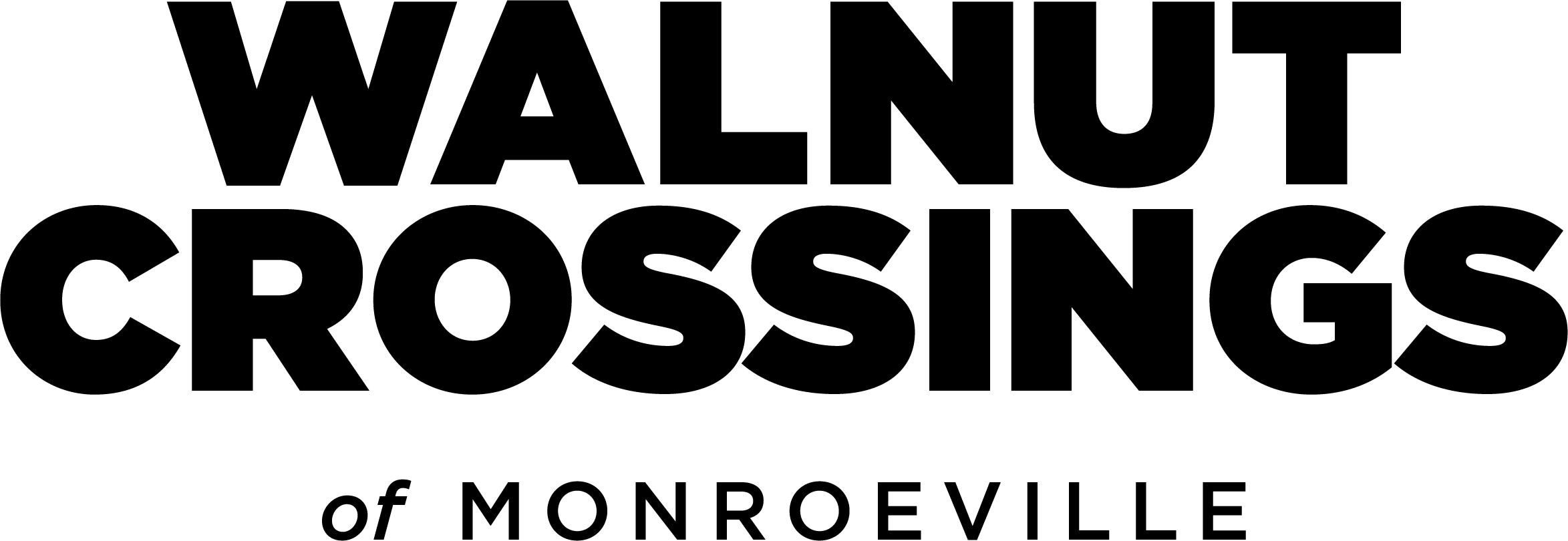A green sign with the words "Walnut Crossings of Monroeville" written in white.