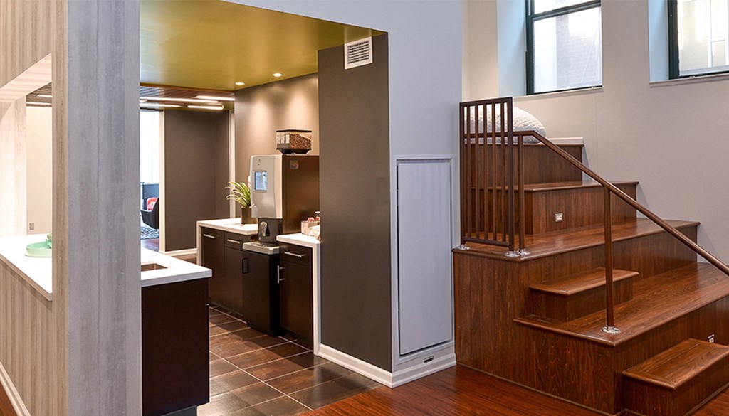 a view of the kitchen and stairs to the second floor at Walnut on Highland, Pittsburgh, PA