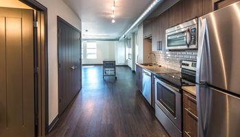 a kitchen and living room