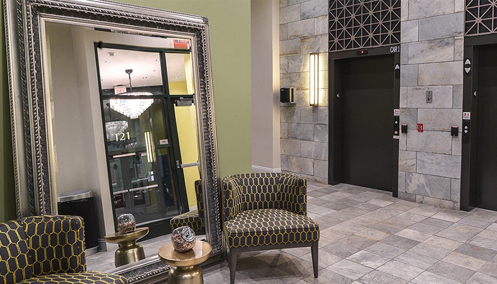 a large mirror in the lobby of a hotel at Walnut on Highland, Pittsburgh, PA