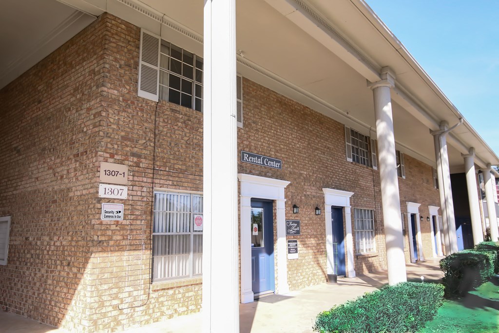two pictures of the outside of a brick building
