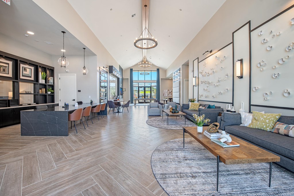 a living room with couches and a table