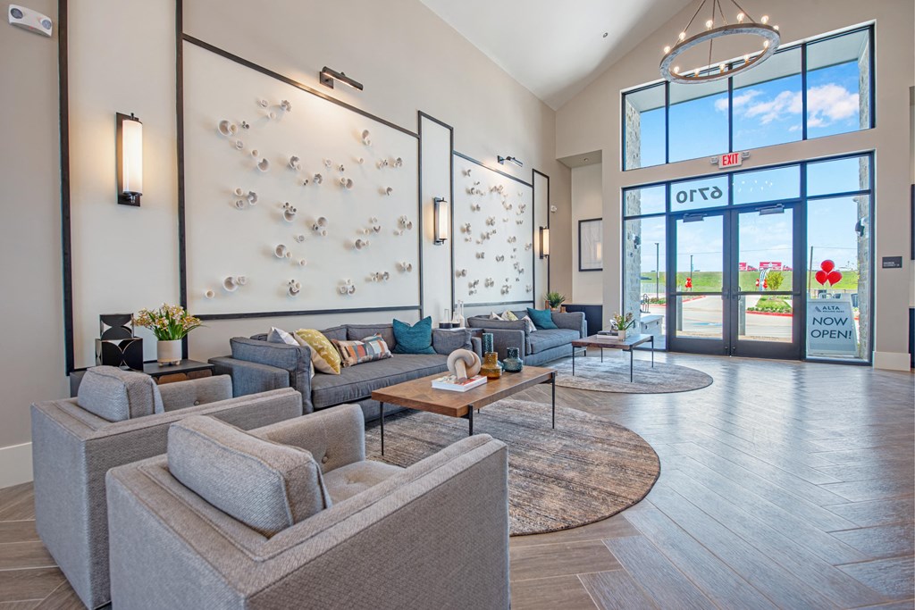 a living room with couches and a table