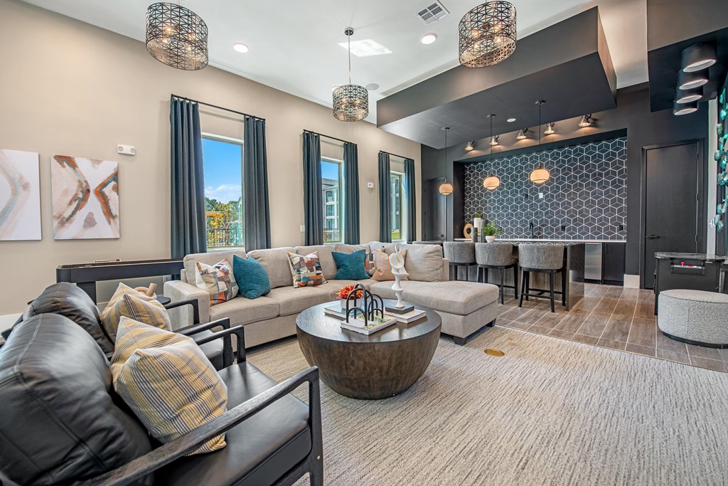 a living room with couches and a table