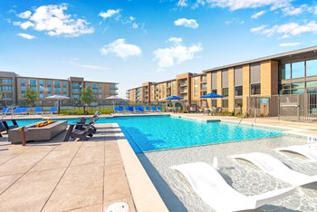 Swimming Pool With Relaxing Sundecks Swimming Pool With Relaxing Sundecks at Alta Grand Crossing, Grand Prairie, 75052 - Photo Gallery 4