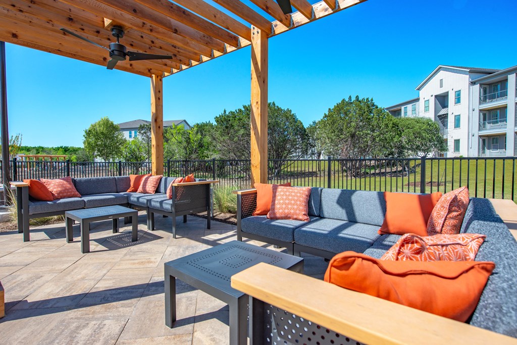 the preserve at ballantyne commons clubhouse patio with couches and tables