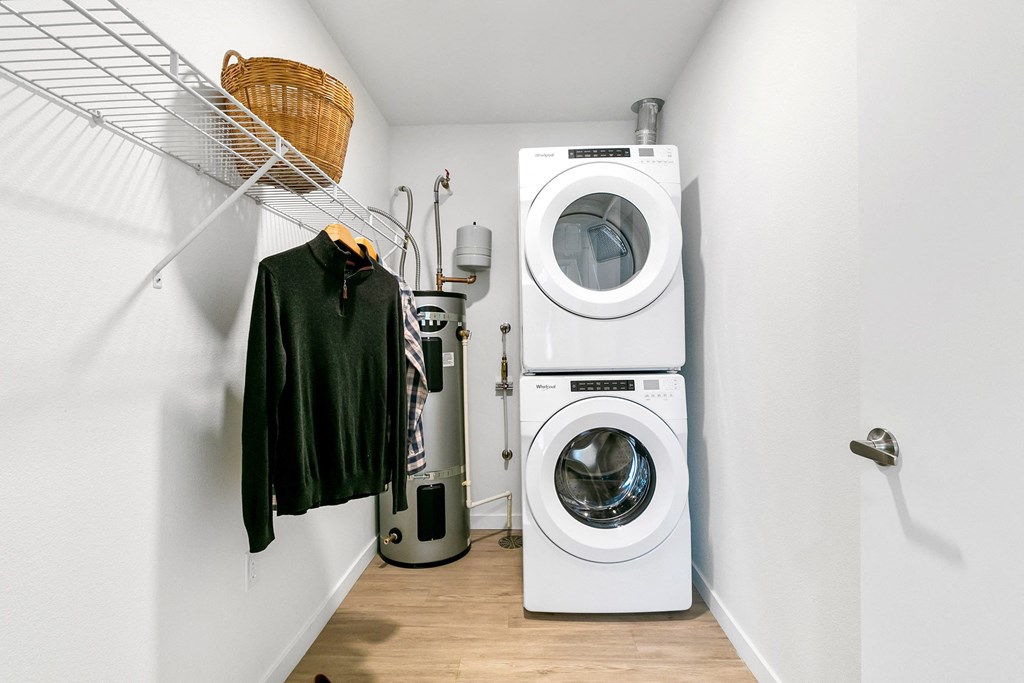 a small laundry room with a washing machine and a dryer
