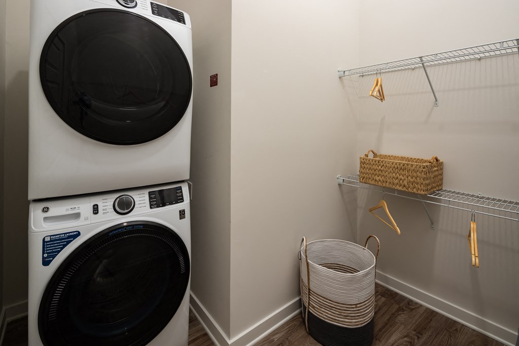a washer and dryer in a laundry room with a closet at Alta Northerly, Georgia, 30028