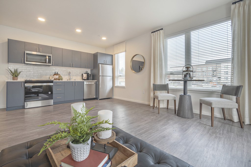 a living room with a couch and a table