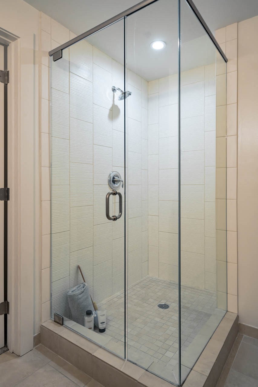 Walk-In Showers With Built-In Bench And Glass Enclosure at The Tower on Piedmont, Atlanta, GA, 30305