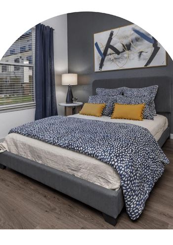 Bedroom with a Large Bed at AVILA Apartments, Oviedo, FL 32765