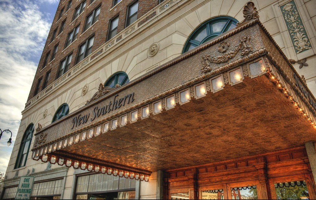 the front of New Southern Apartments in the evening