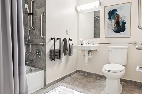 A Bathroom With a White Toilet at Hilldale Apartments, Memphis, TN