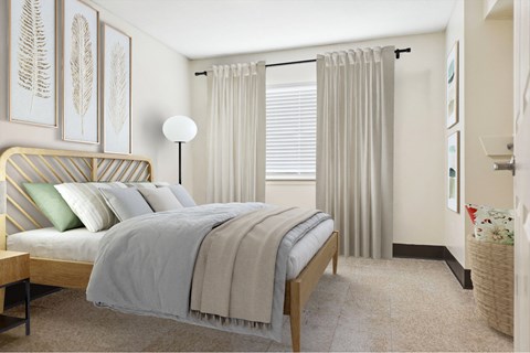 A bedroom with a bed, nightstand, and pictures on the wall.