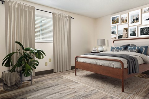 A Bedroom With Potted Plant at Hilldale Apartments, Memphis, TN, 38128