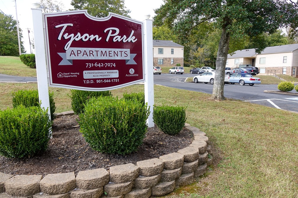 a sign for tyson park apartments