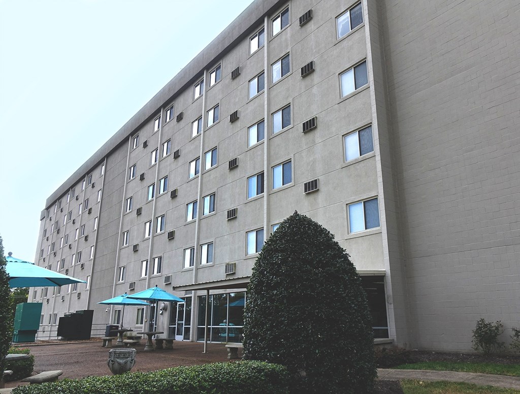 a building with a courtyard in front of it