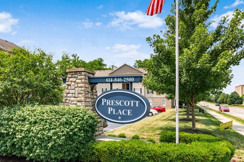 the preserve place sign flag in front of the building