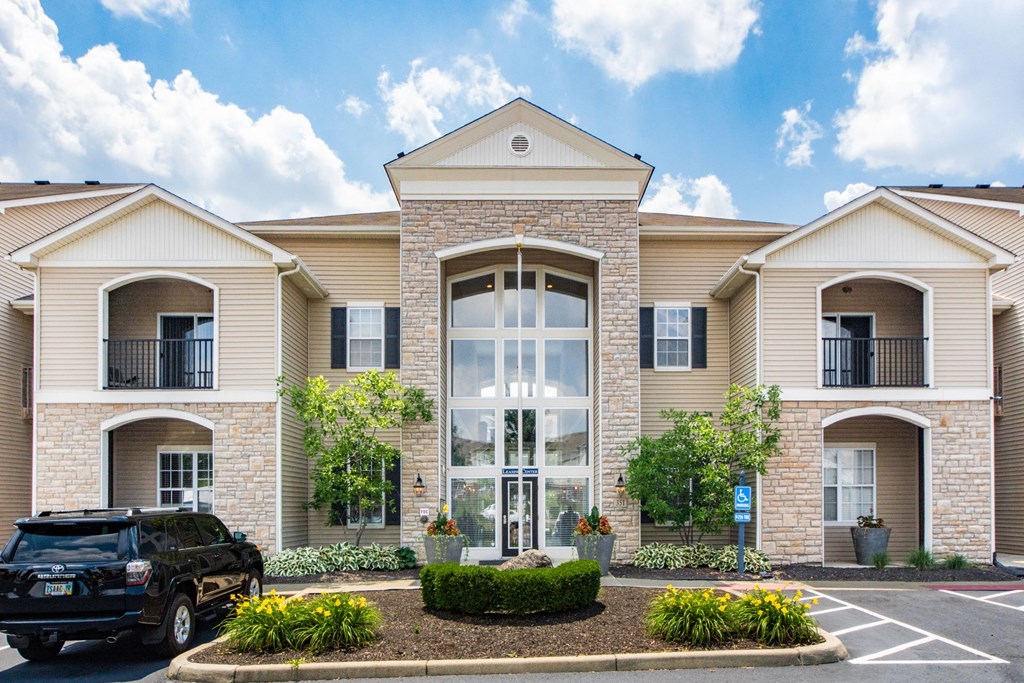 the exterior of a building with a car parked in front of it at Prescott Place, Ohio