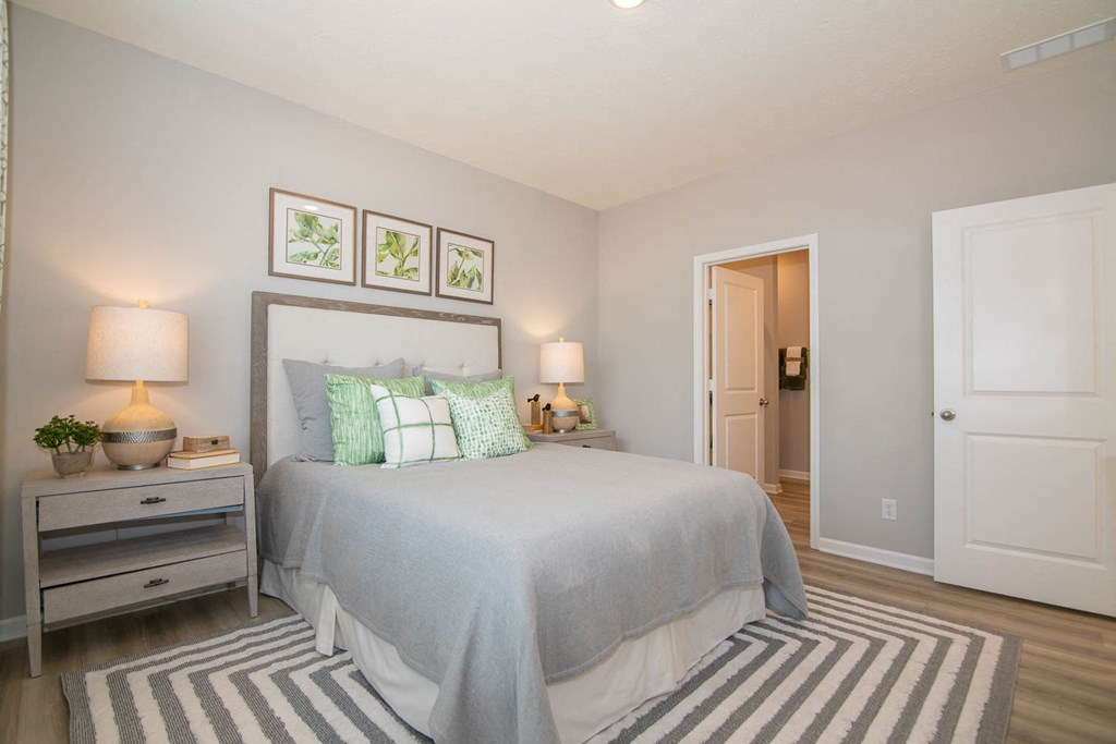 a bedroom with a bed and a rug at Jackson Run Townhomes, Indiana, 46075