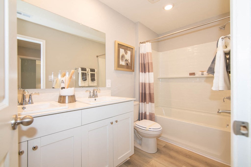a bathroom with a sink and a toilet and a shower at Jackson Run Townhomes, Whitestown, IN 46075