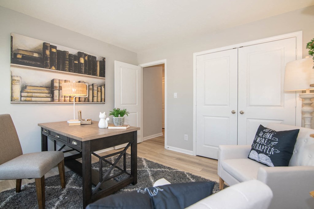 a living room with a couch and a table at Jackson Run Townhomes, Indiana, 46075