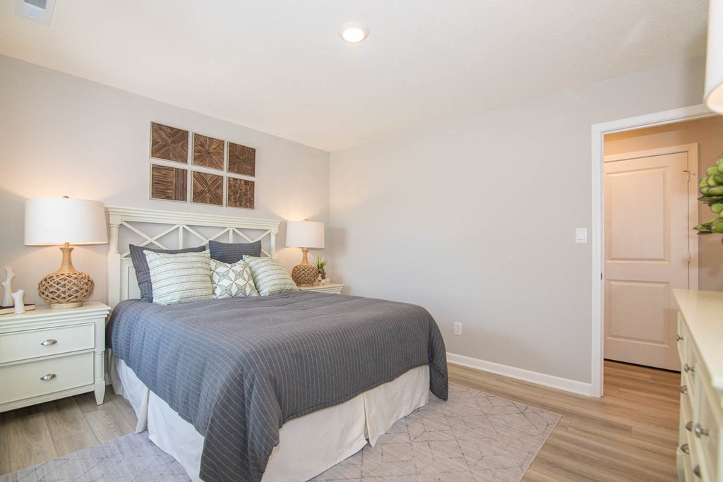 a bedroom with a bed and a closet at Jackson Run Townhomes, Whitestown