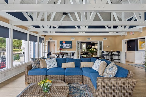 A living room with a sofa and a coffee table.