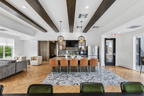 Open concept dining and kitchen with modern finishes at The Ridge Apartments, Cincinnati, 45213