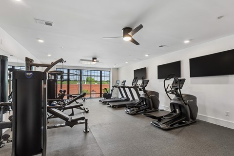Fitness center with cardio and strength equipments at The Ridge Apartments, Cincinnati, Ohio