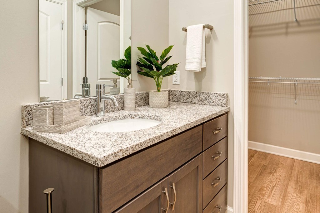 a bathroom with a sink and a mirror at Adelphi Quarter, Columbus, OH