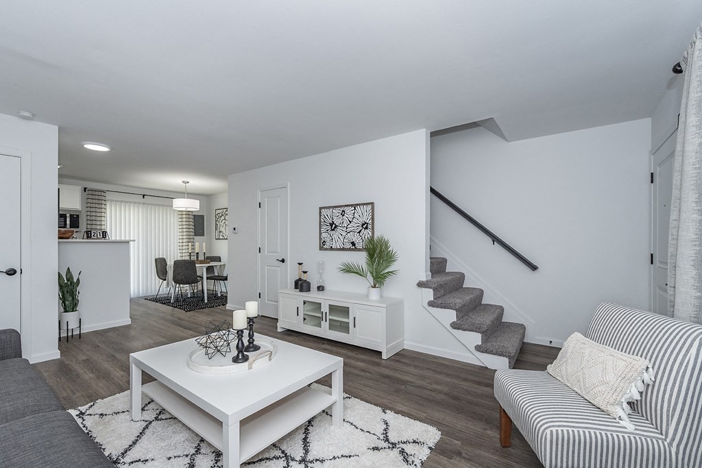 a living room with a couch and a table