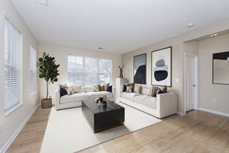 Living room with white interior at Monmouth Row Apartments, Kentucky