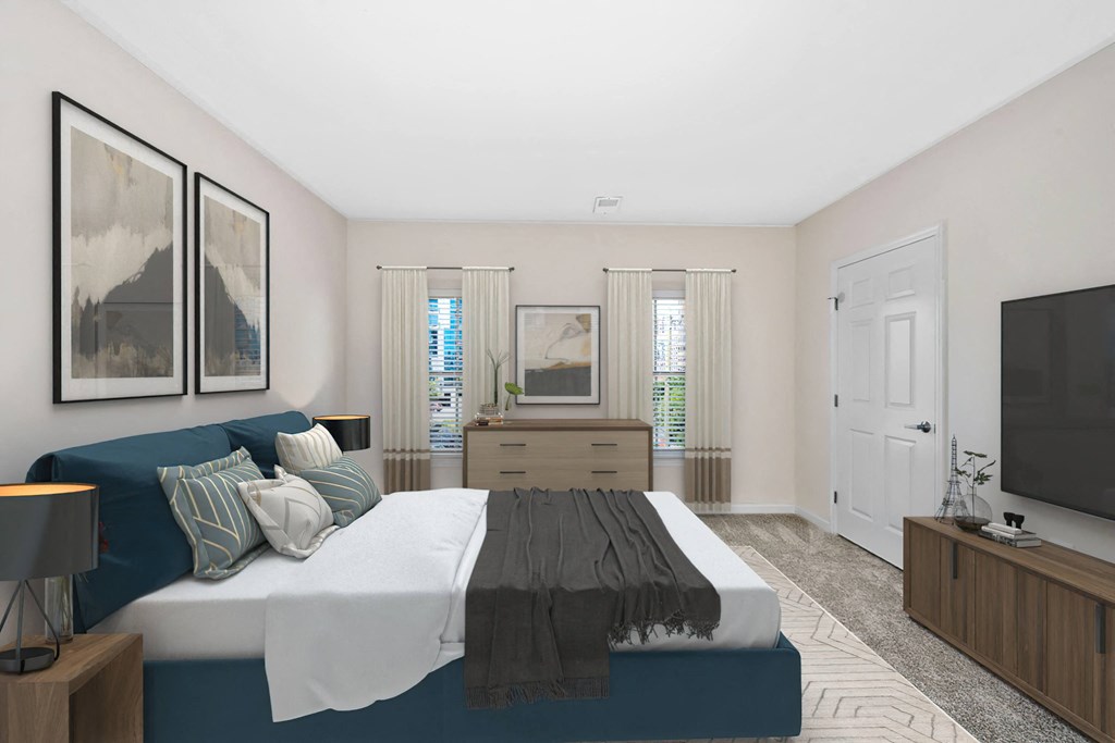 a bedroom with a bed and a tv