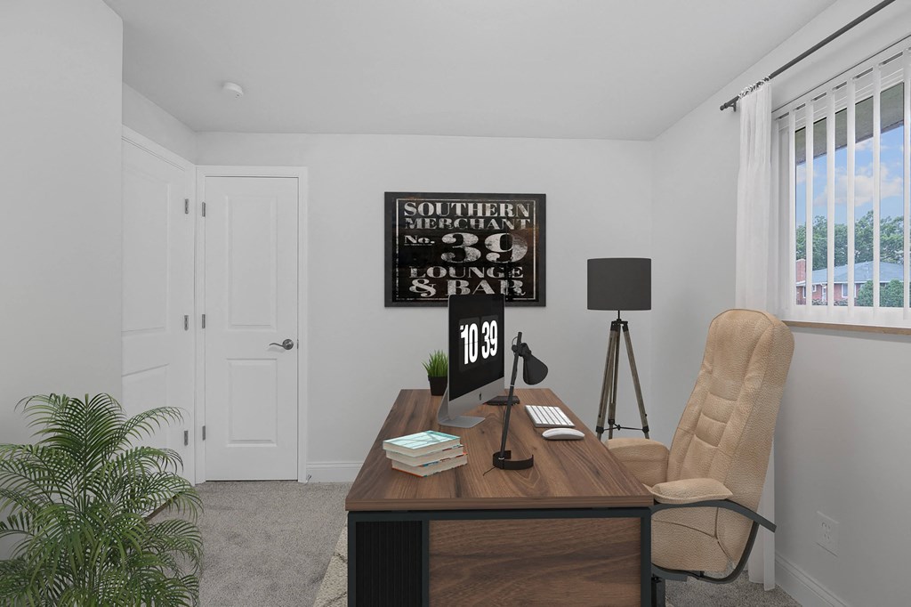 a home office with a desk and chair