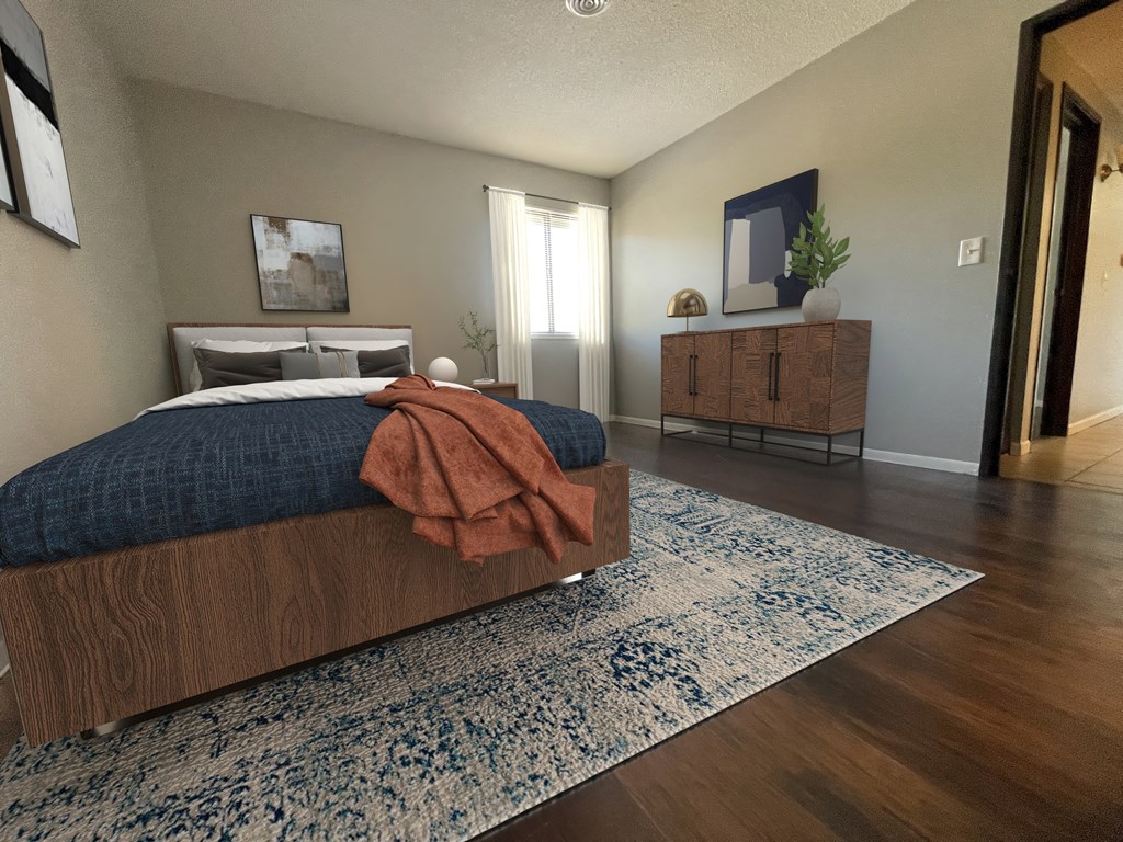 a bedroom with a bed and a dresser