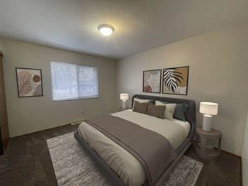 a bedroom with a large bed in a room - Photo Gallery 3