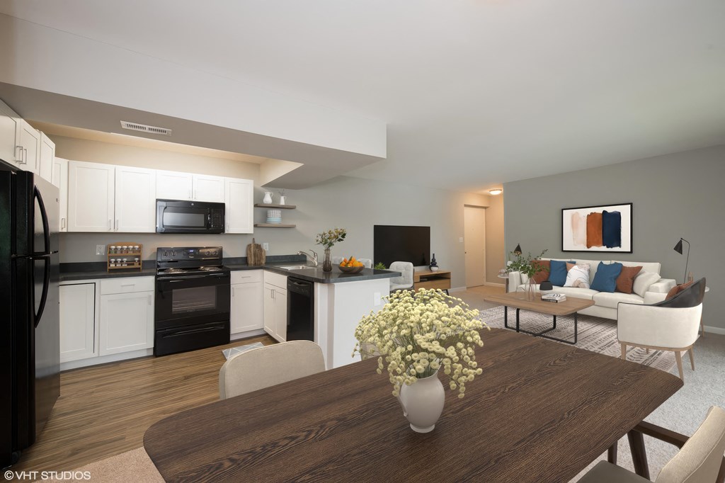 a kitchen and living room in a 555 waverly unit