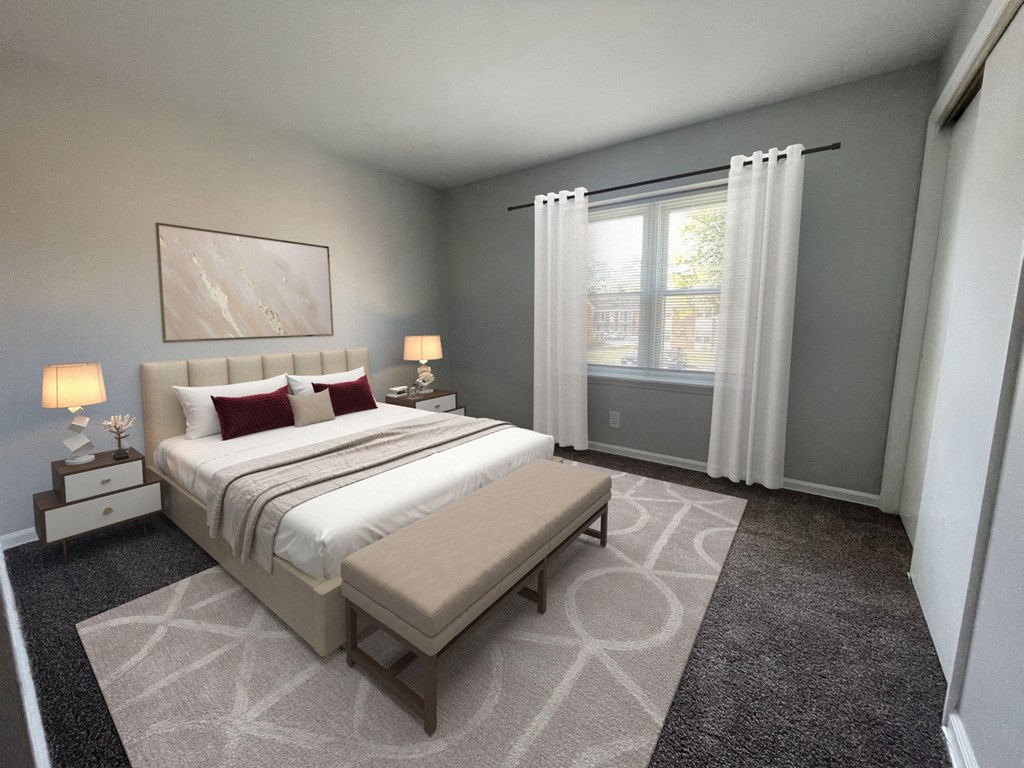 a bedroom with a bed and a window