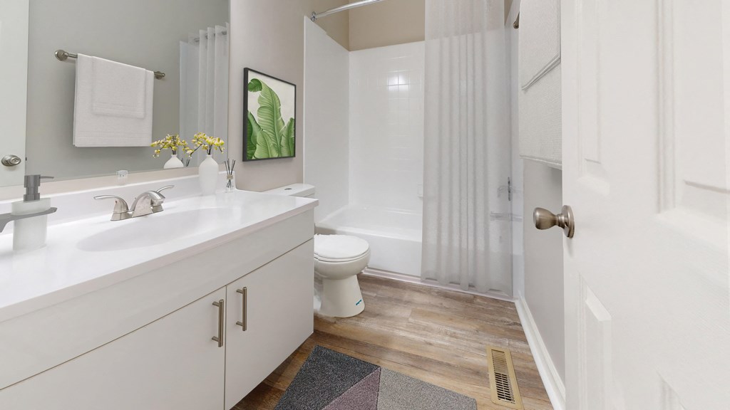 Bathroom with a sink and a toilet and a shower at Summit at Keystone, Indiana